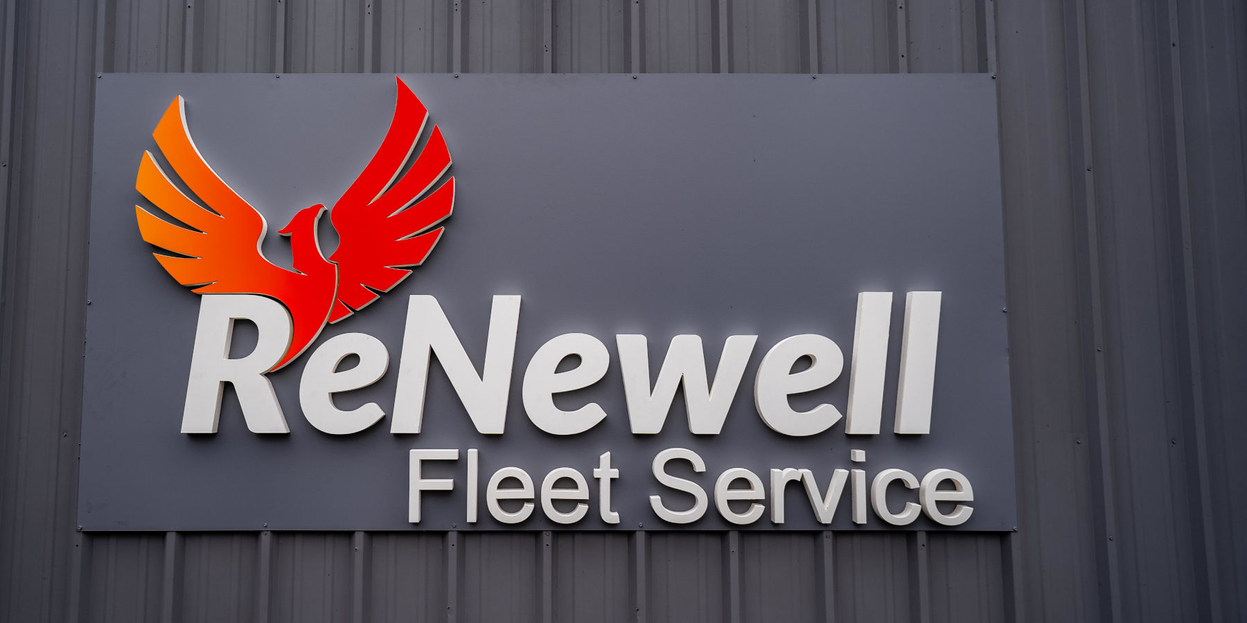 Two Anaheim pumpers in front of stadium